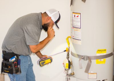 inspecting water heater